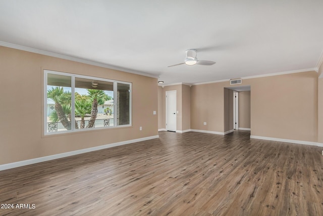 spare room with crown molding, hardwood / wood-style floors, and ceiling fan