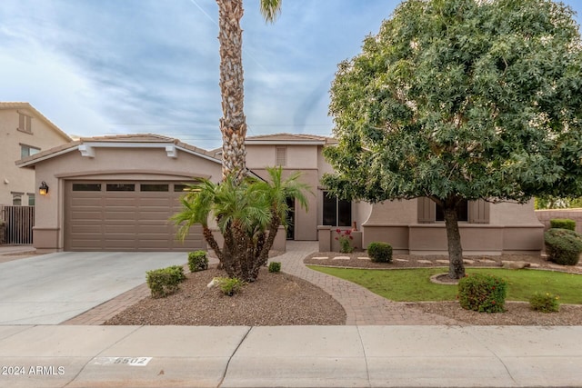 view of front of property featuring a garage