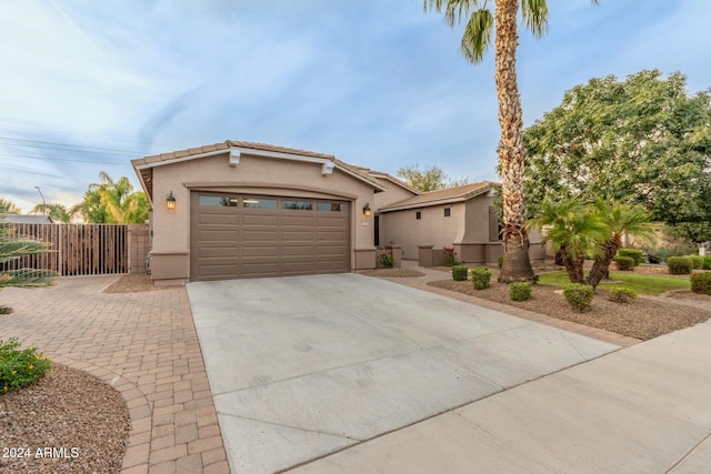 view of front of property featuring a garage