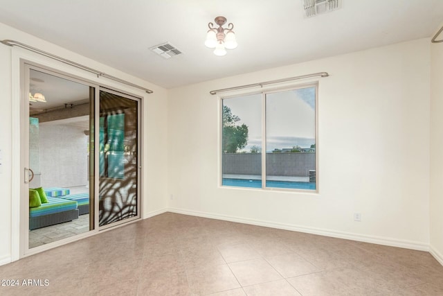 view of tiled empty room