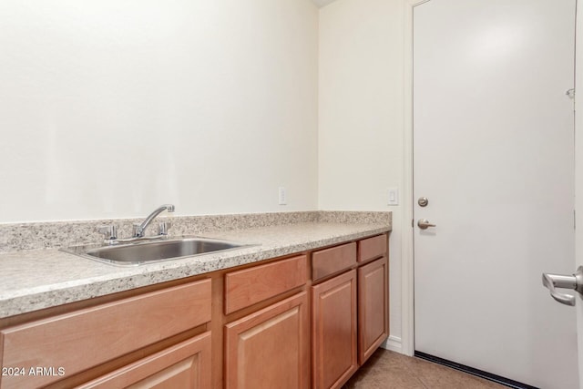 interior space featuring tile patterned floors and vanity