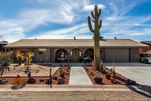 ranch-style home with a garage