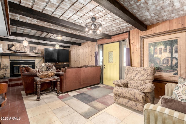 tiled living room with beam ceiling and wooden walls