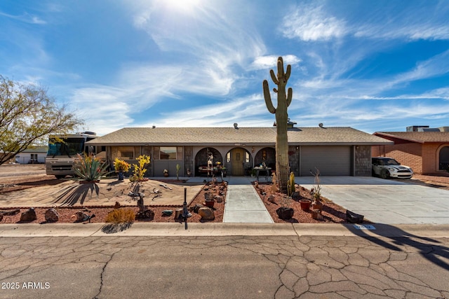 ranch-style home with a garage