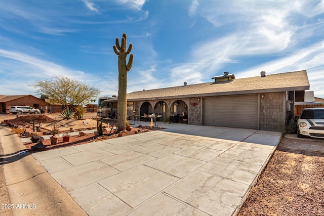 ranch-style home with a garage