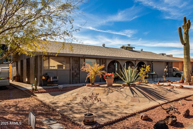 rear view of house featuring a patio area