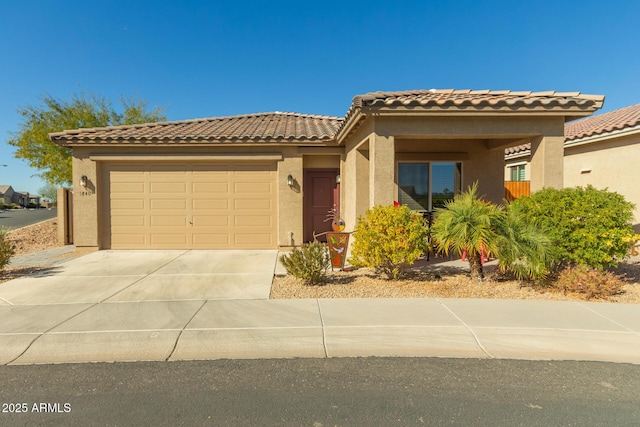 mediterranean / spanish-style home featuring a garage