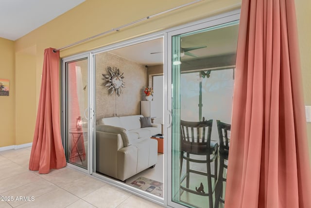 entryway featuring light tile patterned flooring