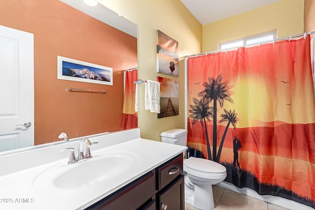 bathroom with toilet, vanity, tile patterned floors, and a shower with curtain