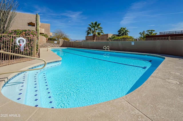 pool featuring fence