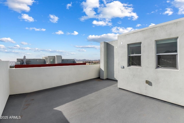 view of patio / terrace with a balcony