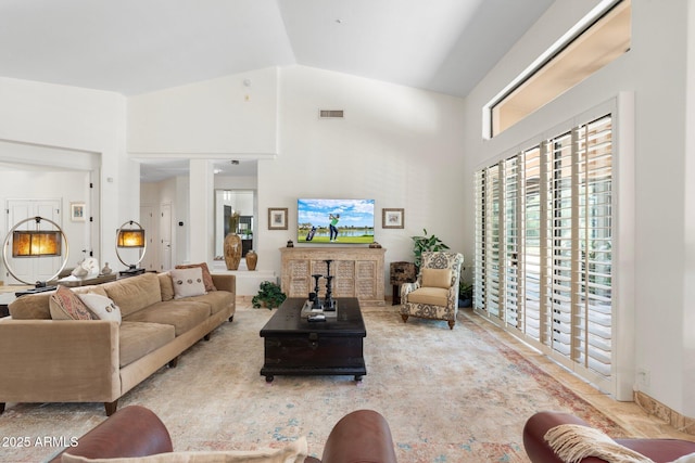 7734 E Monica Dr, Scottsdale, AZ 85255 - carpeted living room with high vaulted ceiling