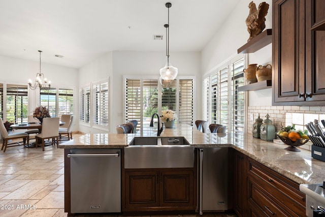 7734 E Monica Dr, Scottsdale, AZ 85255 - kitchen with a sink, stone tile floors, stainless steel dishwasher, and dark brown cabinetry