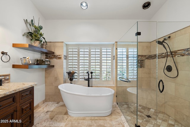7734 E Monica Dr, Scottsdale, AZ 85255 - bathroom featuring a freestanding bath, a shower stall, and vanity
