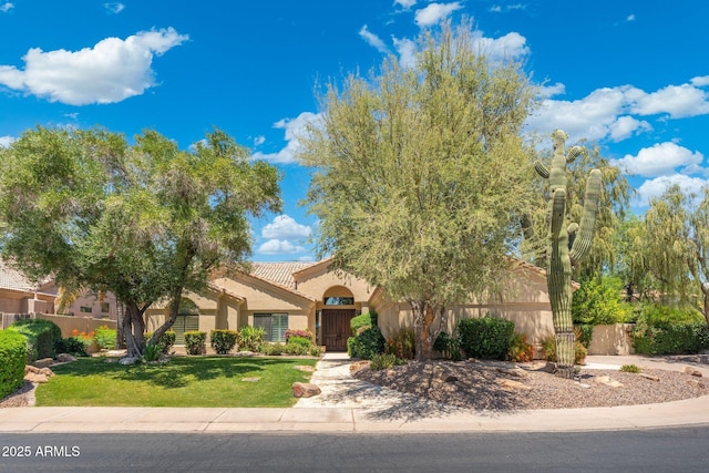 7734 E Monica Dr, Scottsdale, AZ 85255 - view of front of house with stucco siding and a tiled roof