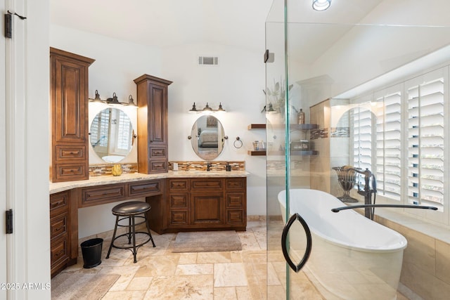 7734 E Monica Dr, Scottsdale, AZ 85255 - full bath featuring plenty of natural light, vanity, a soaking tub, vaulted ceiling, and a shower with shower door