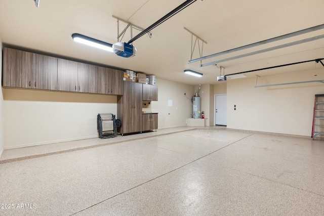 7734 E Monica Dr, Scottsdale, AZ 85255 - garage with a garage door opener, water heater, and baseboards