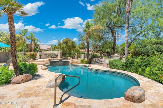 7734 E Monica Dr, Scottsdale, AZ 85255 - view of pool with a patio area and a pool with connected hot tub