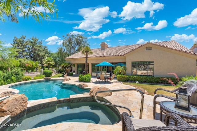 7734 E Monica Dr, Scottsdale, AZ 85255 - view of pool with a patio and a pool with connected hot tub