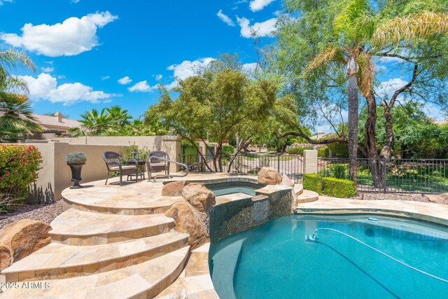 7734 E Monica Dr, Scottsdale, AZ 85255 - view of swimming pool with a fenced backyard, a patio, and a pool with connected hot tub