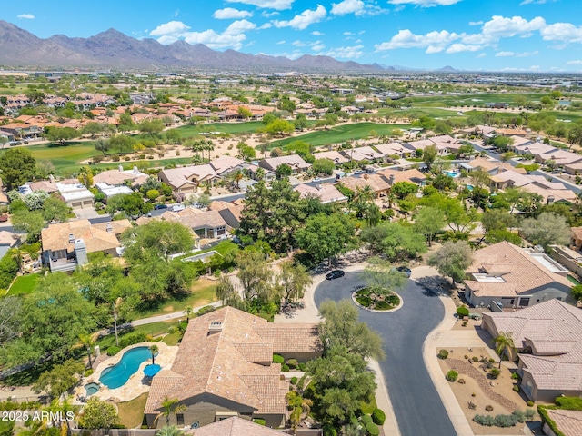 7734 E Monica Dr, Scottsdale, AZ 85255 - aerial view of property and surrounding area featuring a mountain backdrop, nearby suburban area, and a pool area