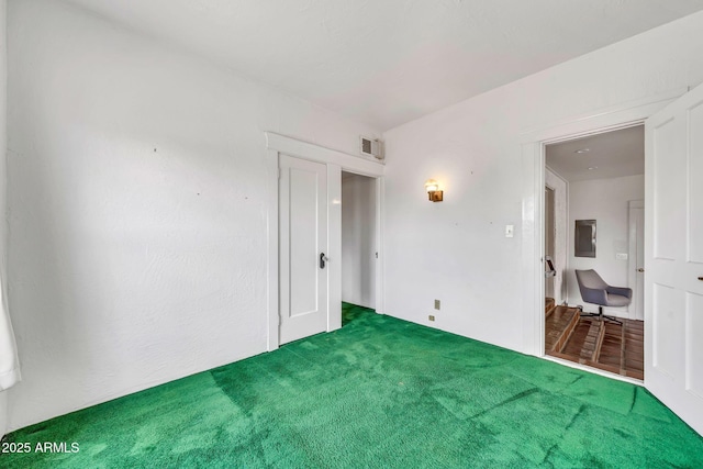 empty room with carpet flooring