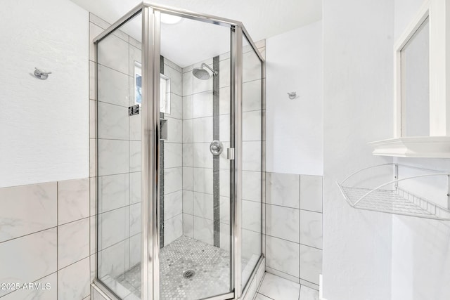 full bath featuring a stall shower