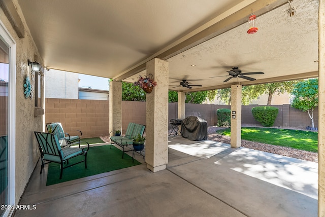 view of patio / terrace featuring ceiling fan and grilling area