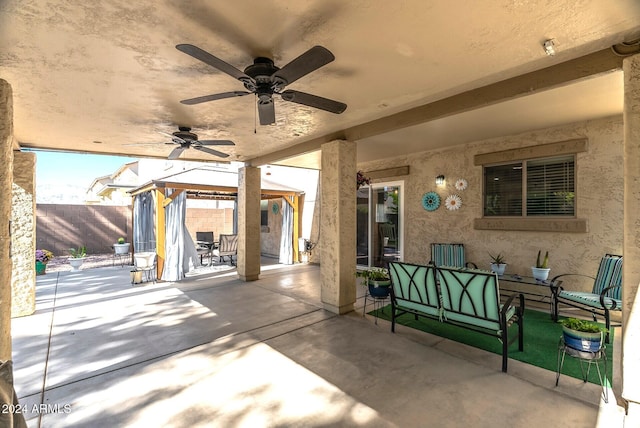 view of patio / terrace with a gazebo and an outdoor hangout area