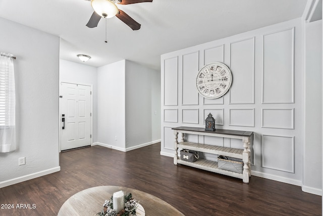 foyer entrance featuring dark hardwood / wood-style flooring and ceiling fan