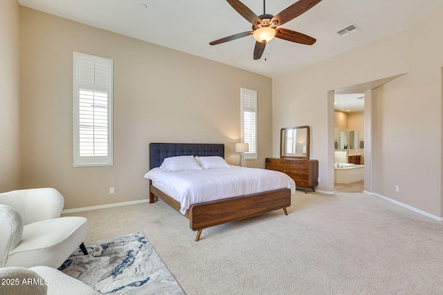 795 W Verbena Ln, Litchfield Park, AZ 85340 - bedroom with multiple windows, light carpet, and baseboards