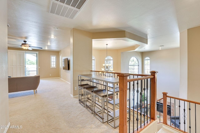 795 W Verbena Ln, Litchfield Park, AZ 85340 - hallway featuring an upstairs landing, carpet flooring, and baseboards
