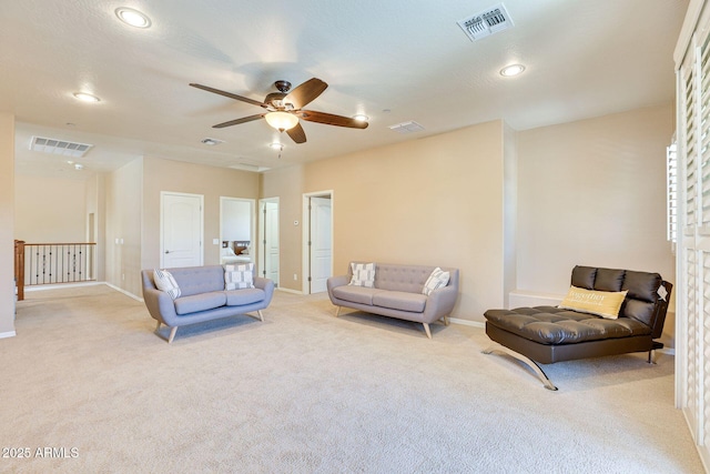 795 W Verbena Ln, Litchfield Park, AZ 85340 - living area with light colored carpet, a ceiling fan, baseboards, and recessed lighting