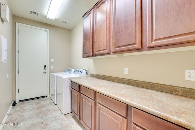 795 W Verbena Ln, Litchfield Park, AZ 85340 - clothes washing area with cabinet space, washer and dryer, light tile patterned floors, and baseboards