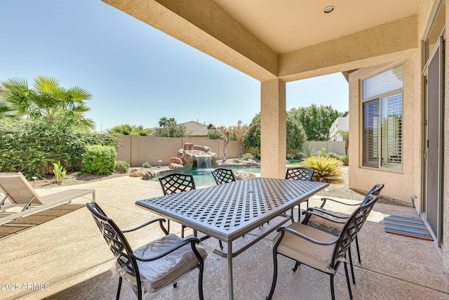 795 W Verbena Ln, Litchfield Park, AZ 85340 - view of patio featuring a fenced backyard and outdoor dining area