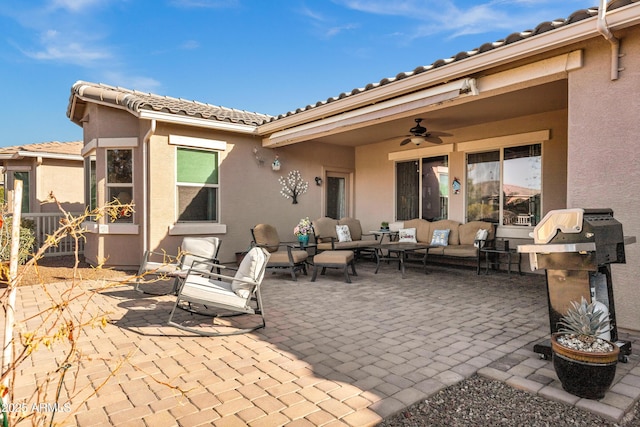 view of patio featuring ceiling fan and an outdoor hangout area