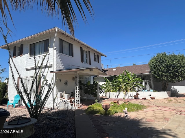 view of front facade with a patio