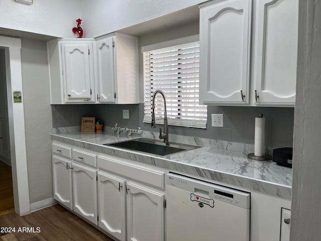 kitchen with decorative backsplash, white dishwasher, white cabinetry, and dark hardwood / wood-style flooring