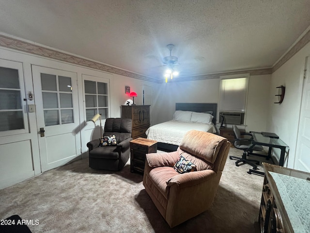 bedroom featuring carpet, ceiling fan, crown molding, and a textured ceiling