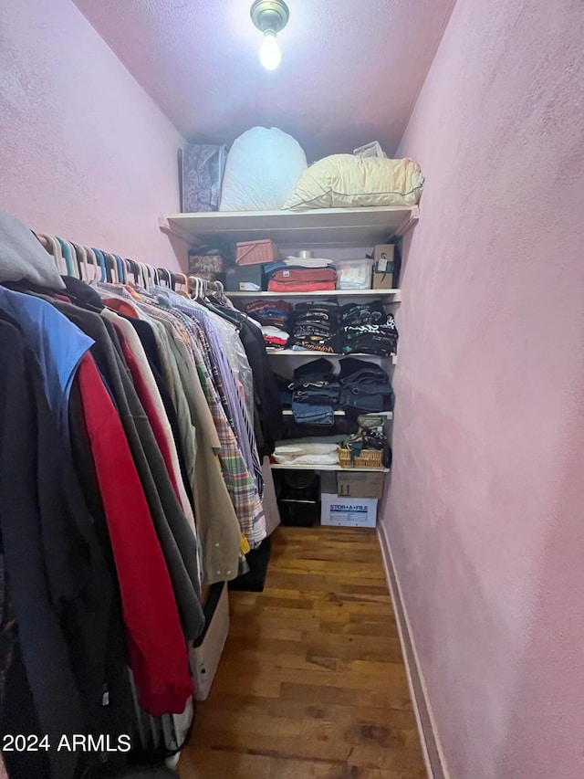 walk in closet featuring wood-type flooring