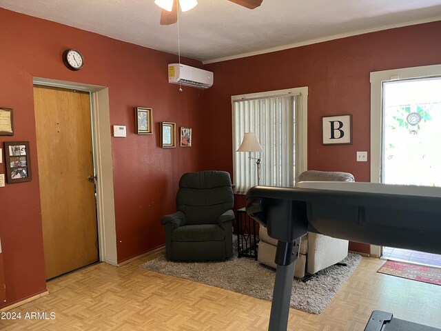 home office with a wall unit AC, light parquet floors, and ceiling fan