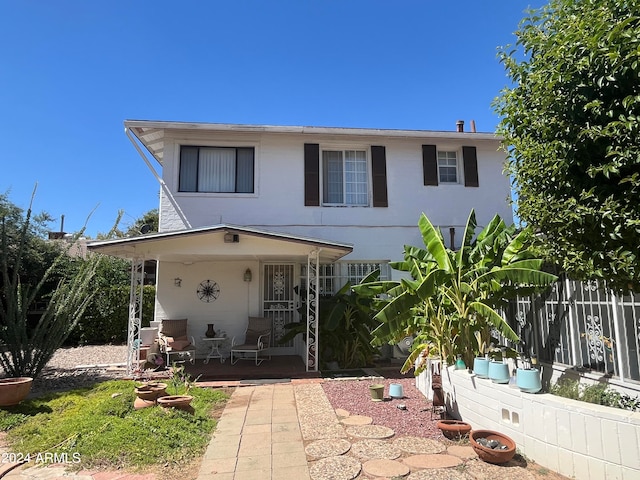 view of front of property with a patio