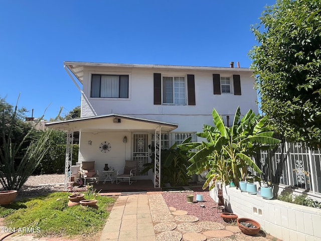 view of front of home with a patio area