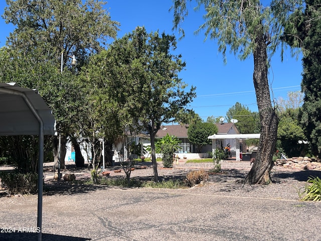 view of front of home featuring a carport