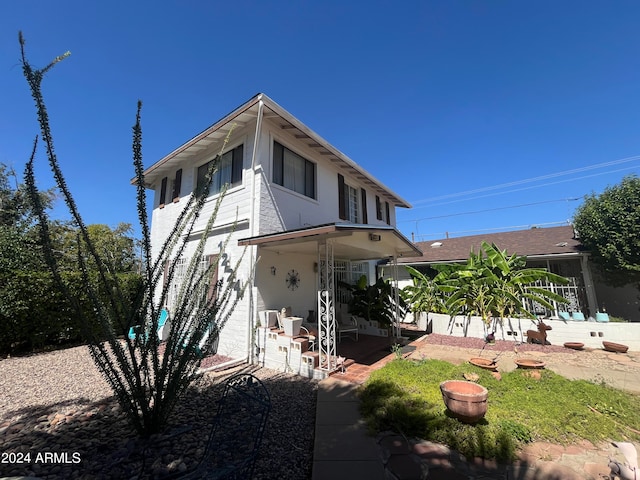 back of house featuring a patio