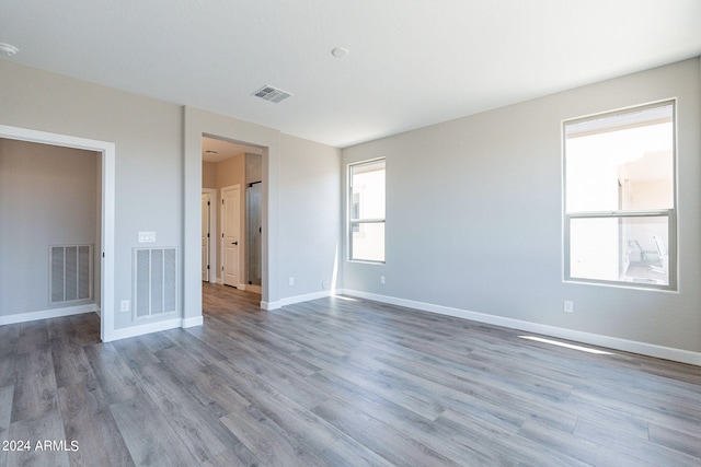 spare room with light wood-type flooring