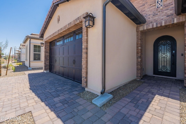 entrance to property with a garage