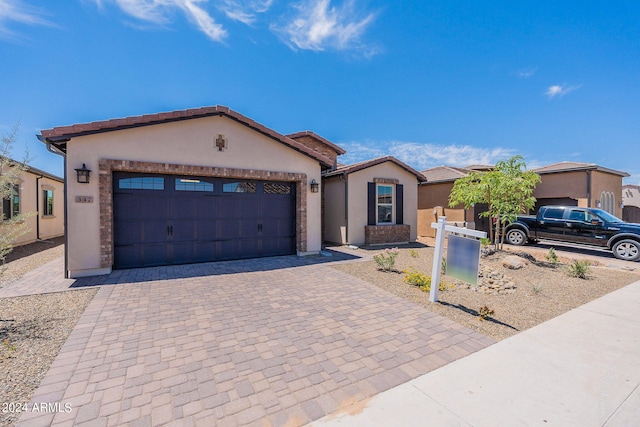 view of front of home with a garage