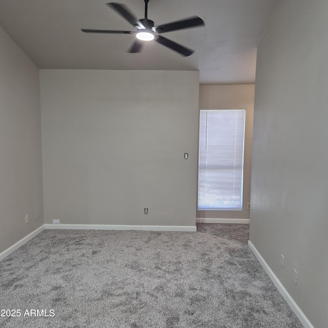 2946 N 14th St N Unit 14, Phoenix, AZ 85014 - carpeted spare room with a ceiling fan and baseboards