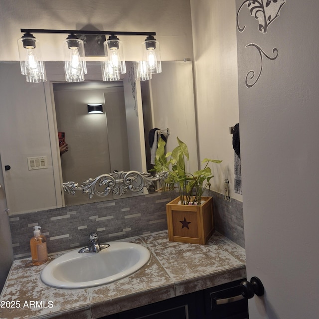 2946 N 14th St N Unit 14, Phoenix, AZ 85014 - bathroom with backsplash and vanity